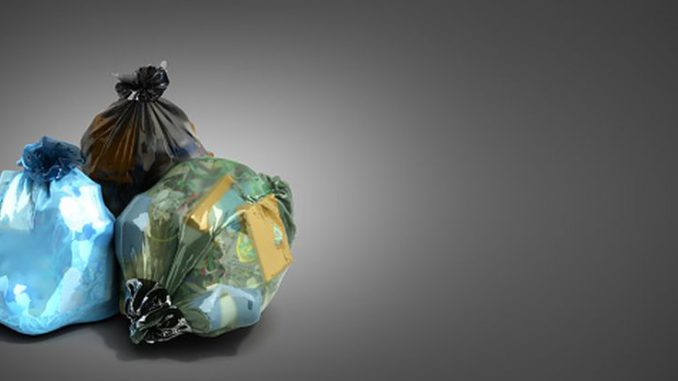 close up of blue garbage bags 3d render on grey background